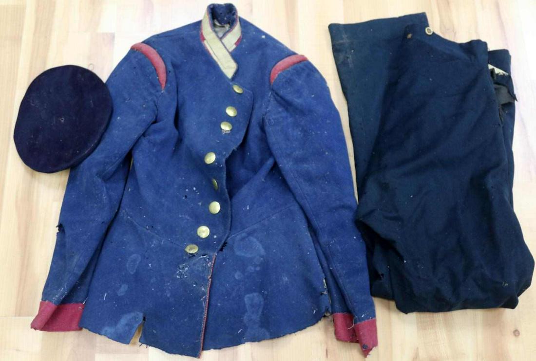 EARLY 19TH CENTURY UNIFORM & CIVIL WAR NAVY CAP: Early 19th century militia tunic and trousers, as well as a US Civil War naval cap with an intact interior liner and sweatband. Militia uniform possesses severe mothing throughout, sometimes running t