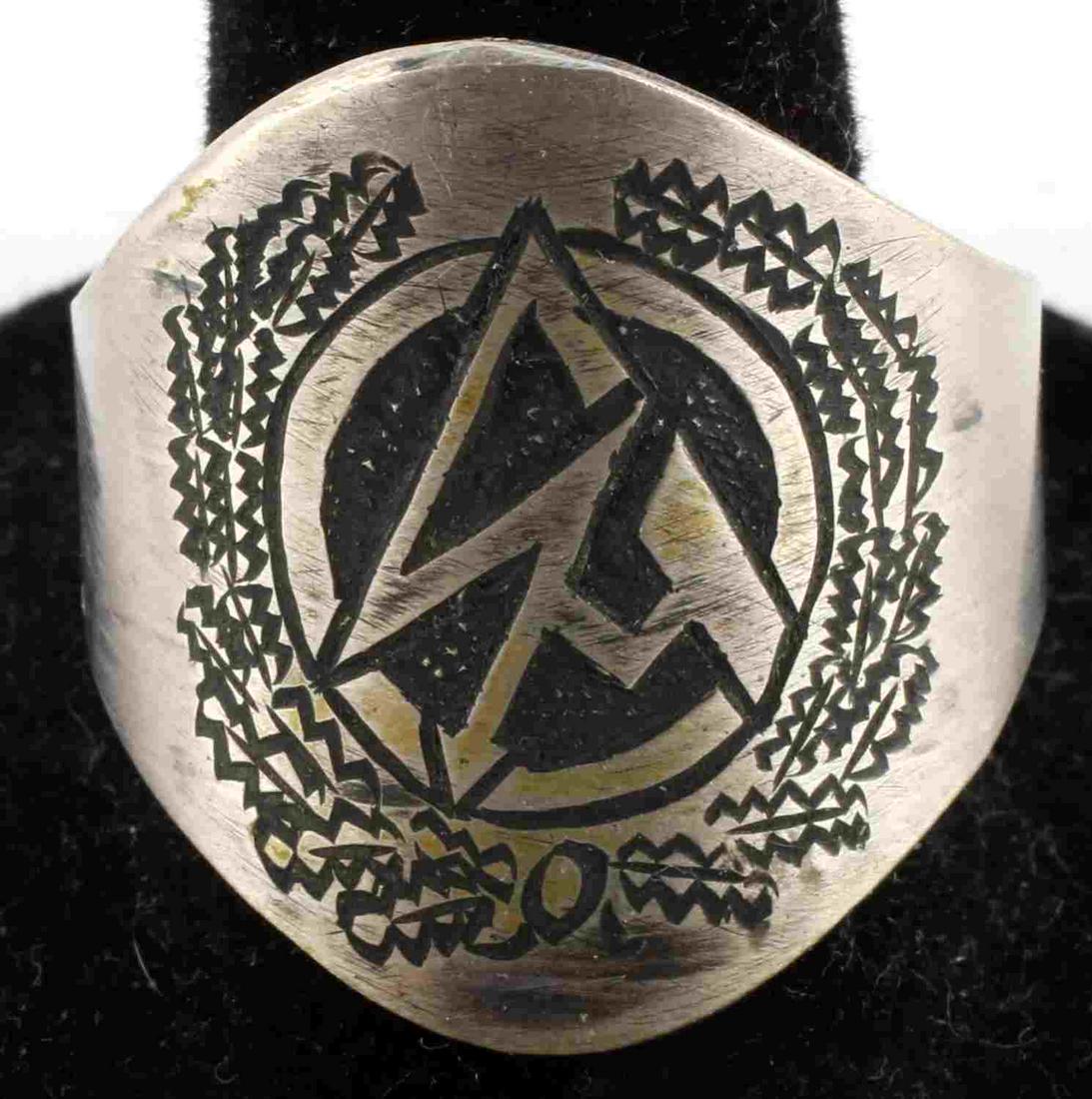 WWII GERMAN SA HIGH RANKING OFFICIAL HONOR RING: 800 German silver ring with etched SA design to front. Marked 800 for silver content. Weighs 7.1 grams. Size 12 This lot has a reserve.