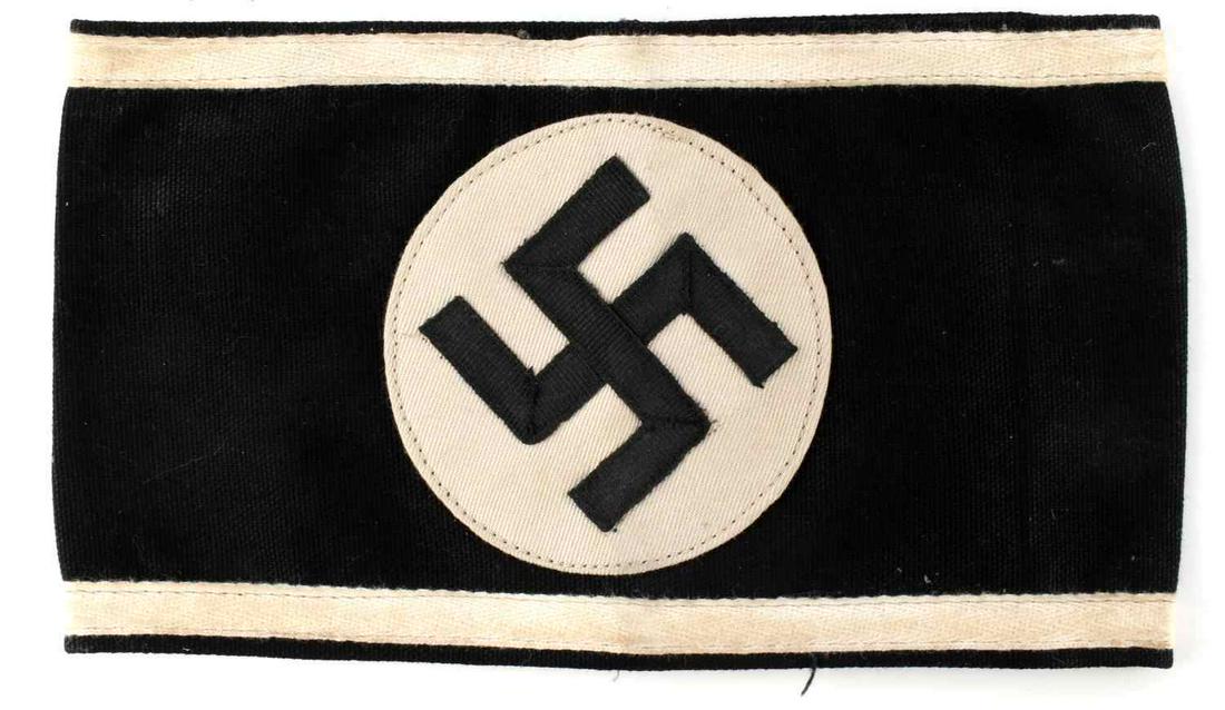 WWII GERMAN SS ARMBAND FOR SUMMER WHITE UNIFORM: Black and white cotton, unknown maker. Measures 8.5 inches wide. Very good condition. This lot has a reserve.