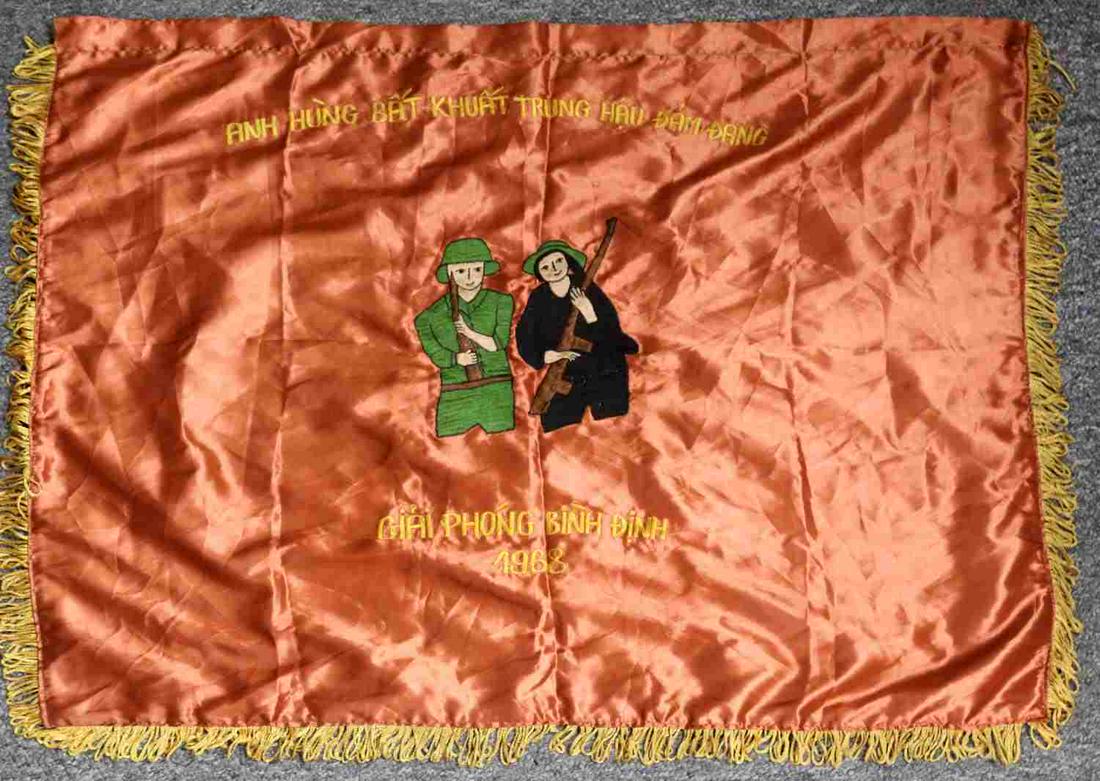 VIETNAM ERA NORTH VIETNAMESE ARMY REGIMENT FLAG: Vietnam Era North Vietnamese Army NVA 1968 Regimental Banner Flag. Measures 39” wide by 28 1/4" inches tall including the yellow satin fringe. The front reads ‘ANH HUNG BAT KHUAT TRUNG HAU DAM DAN