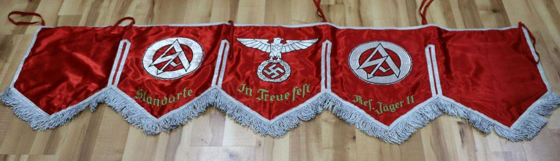 WWII GERMAN THIRD REICH SA STANDARTE DRUM COVER: WWII German Third Reich SA Sturm Abteilung Standarte Drum Cover. Measures 68 1/4 X 20 1/2 inches. The front shows a political eagle clutching a swastika in his talons. Has the SA emblem on each side.