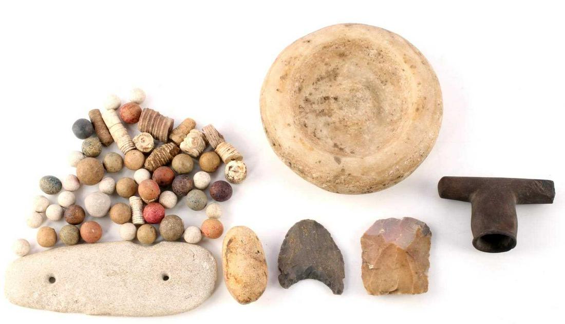 VARIETY OF PRE COLUMBIAN NATIVE AMERICAN ARTIFACTS: Lot features a discoidal, gorget, an arrowhead, game balls, fossils, and more. Stone construction. Nice patination and mineralization. Measurements range 1/2 - 5 1/8 inches.