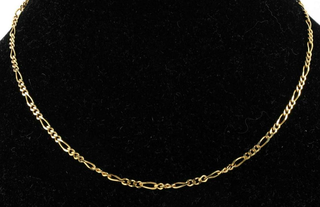 FIGARO LINK 10K YELLOW GOLD 11 INCH ANKLET: 1.95 millimeters thick figaro link yellow gold anklet. Tag next to clasp is stamped "417 Italy". Anklet has been acid tested for purity. Weighs 1.9 grams total. This lot has a reserve. This lot has a