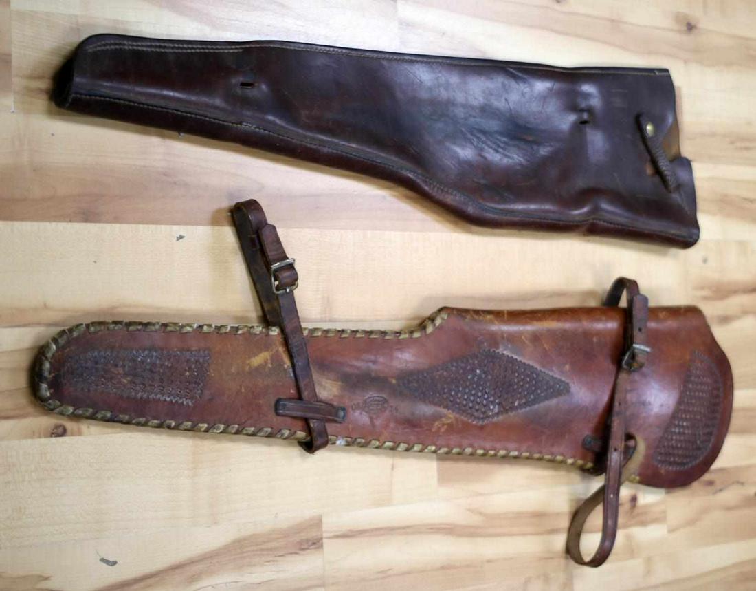 LOT OF 2 VINTAGE LEATHER RIFLE GUN CASES: The lighter one with woven patches measures 36.5 inches with two straps. Dark leather one is made by Black Sheep Brand and measures 34.5 inches with opening at muzzle end. Good condition.