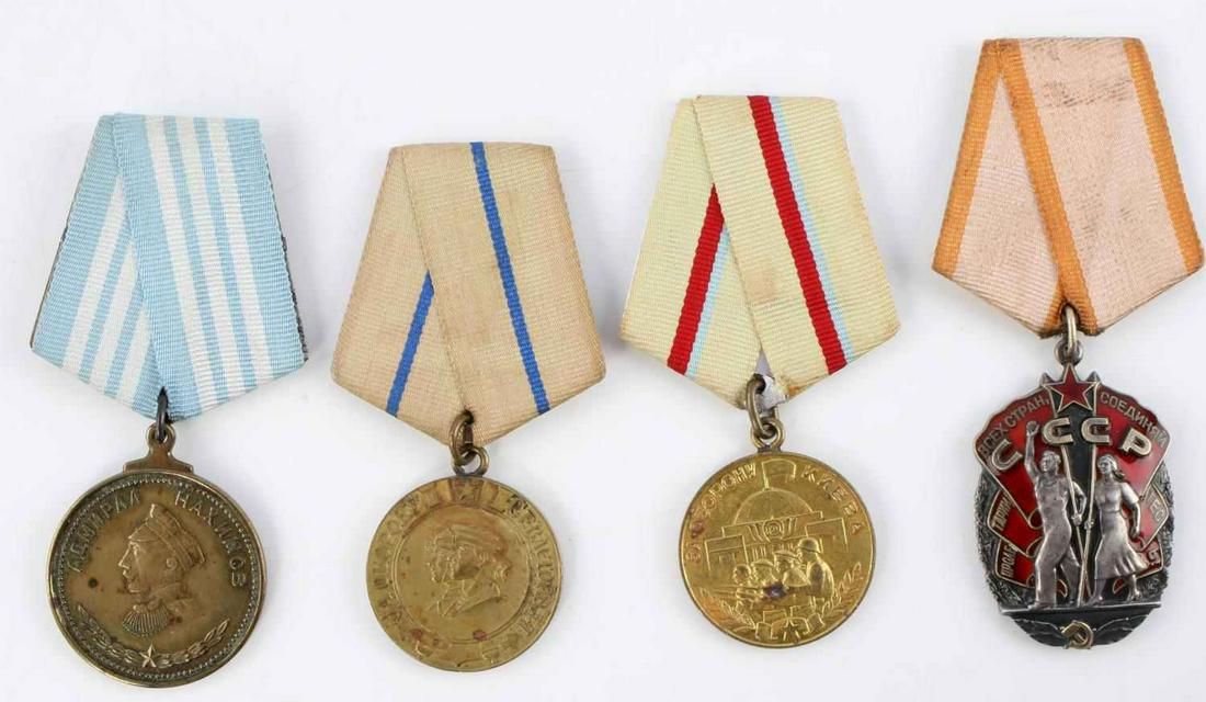 4 RUSSIAN SOVIET MEDALS KIEVE NAKIMOV SEVASTOPOY: Medals include The Kiev Defense medal, Soviet Order Badge of Honor, Nthe Nakimov medal, and the Sevastopoy defense medal. Very good condition. Measure 1 1/2 -1 3/4 inches.