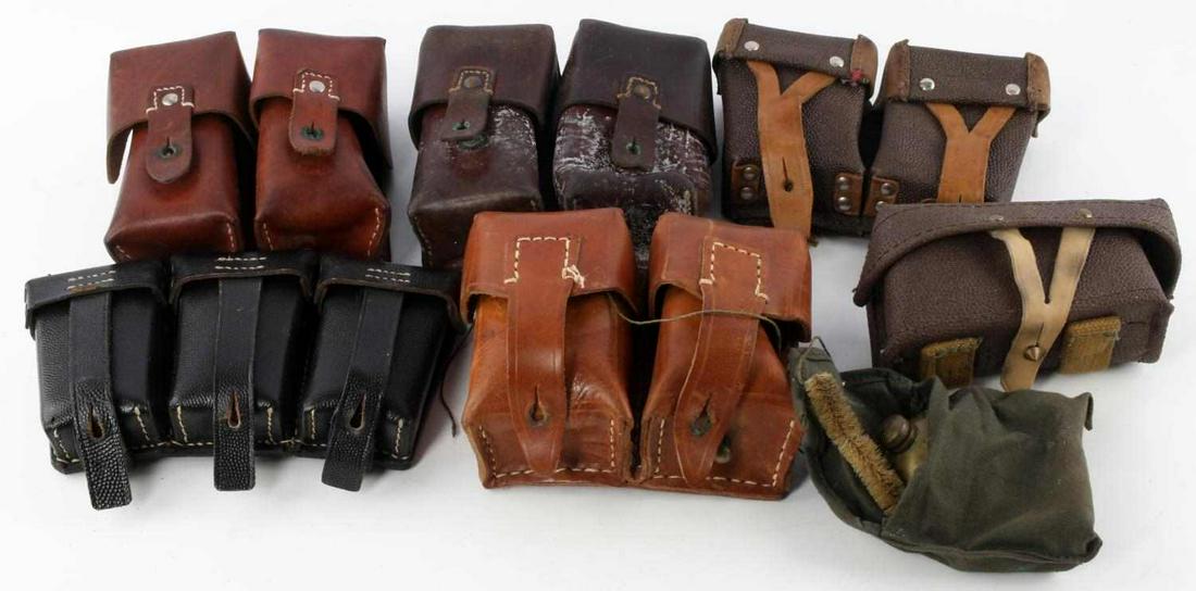 WWII & COLD WAR MILITARY POUCHES GERMAN & SOVIET: WWII & Cold War military pouches some likely Soviet, German and perhaps British. 6 pouches in total. Includes a gun oil container, rifle cleaning kit, and gun cleaning rope. All in good overall condit