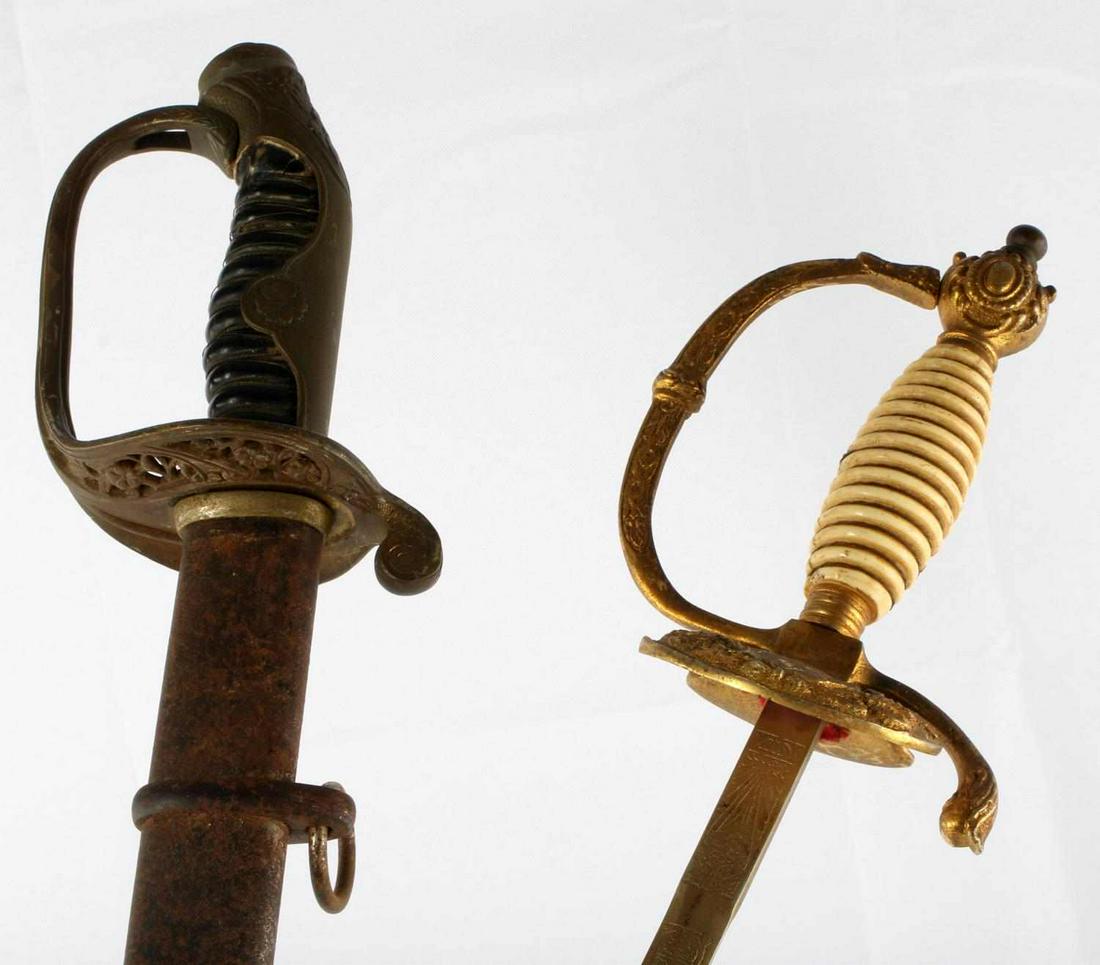 LOT OF 2 WWII JAPANESE OFFICER AND FRATERNAL SWORD: Lot features a Japanese officer dress sword. Steel blade and scabbard with Bakelite grip. Heavily oxidized with unfurled wire. Good condition. Other sword is an unknown dress sword. Likely fraternal. 