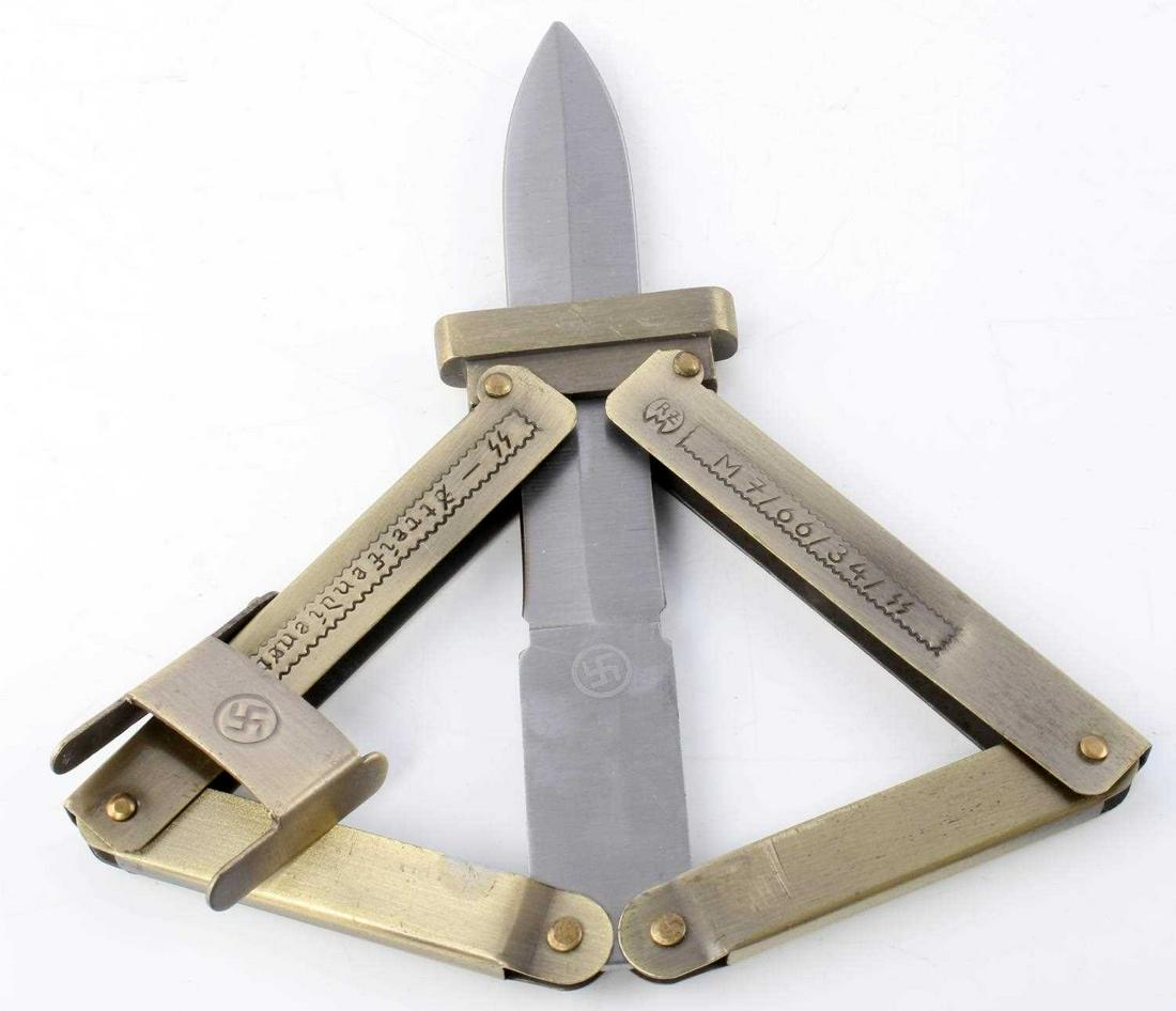 WWII GERMAN THIRD REICH PARATROOPER FOLDING KNIFE: Marked RZM M7/66/34/ss on the front handle, stamped stainless china on the reverse of the blade. Unauthenticated, sold as is. This lot has a reserve.