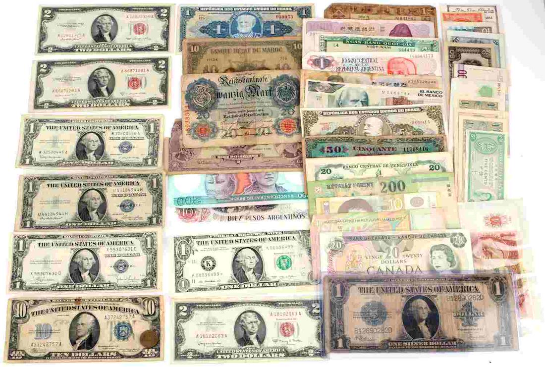 WORLD & U.S. BANKNOTE CURRENCY LOT GOOD VARIETY: Partial listing include large size blue seal 1932 Silver certificate, 1979 $20 XF Canada note, 3 red seal $2.00 notes, FRN 2013 mis cut star note, WWII invasion notes, Last Soviet Union bank note, $14