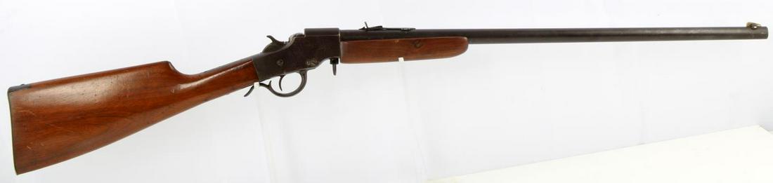 1900s HOPKINS & ALLEN NO 922 .22 CAL BOYS RIFLE: 1890-1915 Hopkin & Allen No. 922 .22 caliber lever action junior rifle. Steel with wooden stock and hand guard construction. 24 inch barrel marked to top "The Hopkins & Allen Arms Co. Norwich, Conn. U