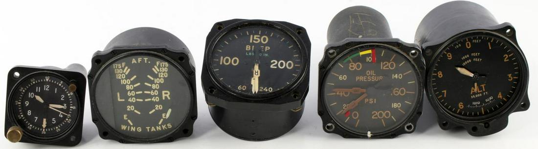 WWII AIRCRAFT INDICATOR LOT 8 DAY CLOCK WING TANKS: Six instruments Type A-13A Waltham 8 day, push button manual wind working and keeps time tested for 2 hours, SA/685 altimeter, no glass, Liquodometer aft. wing tanks gauge, autosyn oil indicator, and