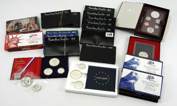 SILVER & CLAD PROOF IKE PRESTIGE MIXED LOT: A nice mixture of proof, prestige, state quarters, presidential sets and more as follows: proof sets in clad-1970, 1973, 1974, (2)1976, (5) 1977,1995, silver sets are (3)1976 with one out of envelope,