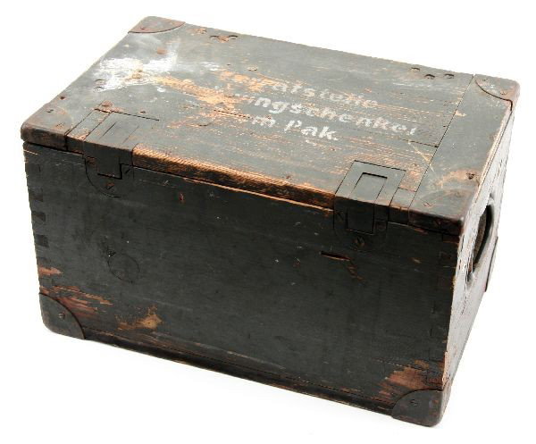 WWII GERMAN AMMUNITION OR EQUIPMENT FIELD BOX: WWII German wood crate for ammunition or field equipment. Lettering on lid partially obscured. Two metal latches, and carrying handles. Overall good condition.