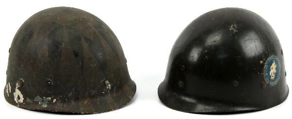 TWO DISTINCTIVE US M-I HELMET LINERS: Two distinctively marked US M-1 helmet liners. The first, repainted, with USARCARIB School (U.S. Army Caribbean Training Center) logo on either side. USARCARIB, located in Panama, would later become t