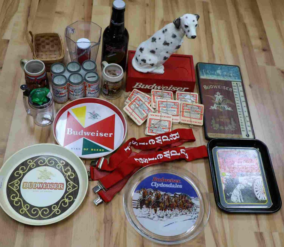 LARGE BUDWEISER MEMORABALIA LOT BIG VARIETY: Includes Dalmatian, 2 steins. 14 inch glass bottle, pitcher with beer can ice container, coasters, glass plastic and metal trays, Budweiser suspenders, empty six pack with pop tops and a bank, talking