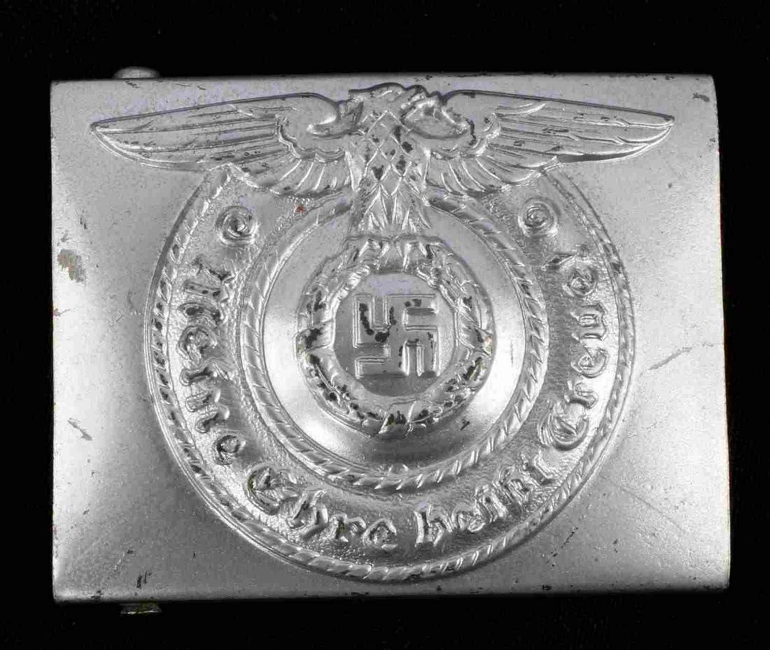 WWII THIRD REICH GERMAN BELT BUCKLE RZM: Shiny aluminum construction with eagle and design in relief, RZM SS OLT/62637 marked to reverse. Very good condition. Unauthenticated, sold as is.
