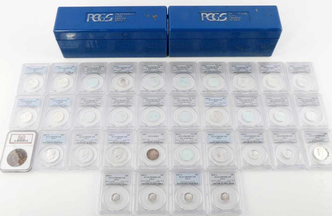 $9.60 SILVER DCAM COIN DOLLAR HALF QUARTER DIME: Total face value of $9.60. Lot includes 21 PCGS graded and slabbed Deep Cameo Proof PR69 state quarters, 6 silver Roosevelt dimes and 5 silver Kennedy half dollars. One 1923 NCG graded MS61 Peace Doll