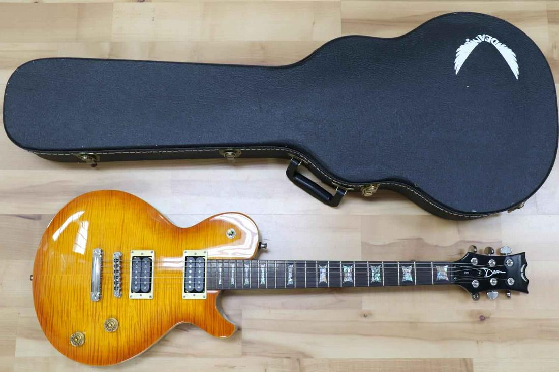 DEAN EVO ELECTRIC GUITAR W SUNBURST PATTERN & CASE: Carved Flame Top, Alder Body, 24-3/4" Scale,1-11/16" Nut, Set Maple C Neck, Rosewood Fingerboard, Pearl Dot Inlays, Grover Tuners, Chrome Hardware, Tune-O-Matic Bridge, DMT Design Pickups, 2 Volume 2 