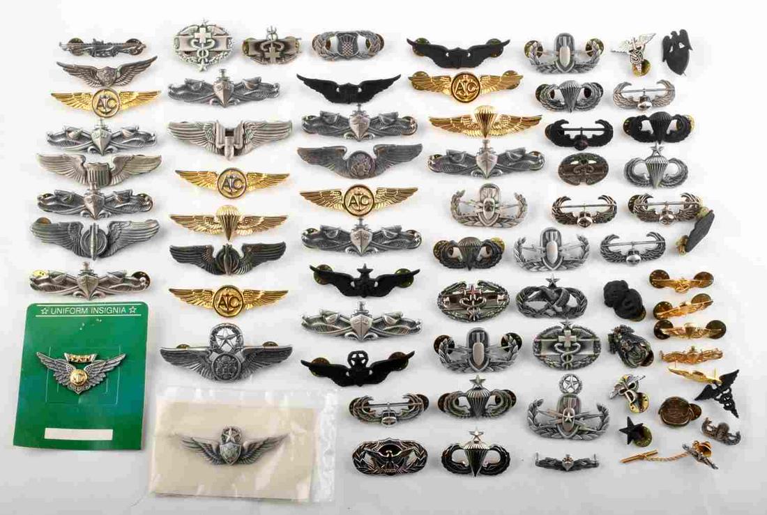 OVER 1 1/2 POUNDS OF WWII TO VIETNAM WINGS & BADGE: WWII Wings to current , Air Crew, Submariner badges, EOD, combat medic , surface warfare, airborne and much more. None are sterling stamped, all non sterling.