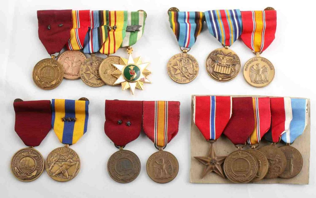 17 MULTICONFLICT US MILITARY MEDALS W DEVICES: Lot features 17 medals and several ribbons with devices. WWII to Vietnam. Medals featured are a Bronze Star, National Defense, German Occupation, Korean Service, Naval Good Conduct, Vietnam Campaign, 