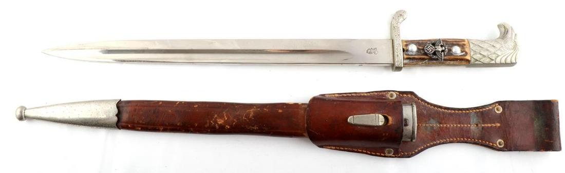 WWII GERMAN REICH POLICE DRESS DAGGER BAYONET: WWII German Reich police dress dagger bayonet with scabbard featuring matching serial numbers and leather frog. Blade measures 13 inches long, sporting some very light service wear near the tip. Obver