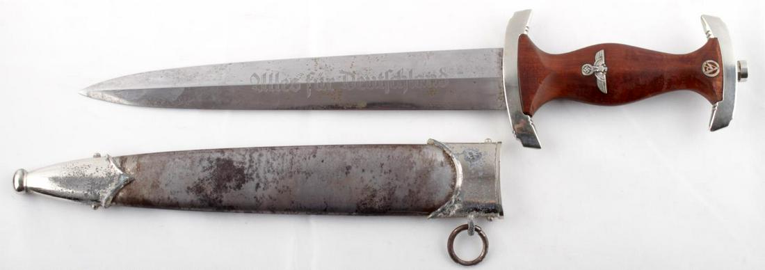 WWII GERMAN THIRD REICH SA DAGGER RZM W SHEATH: Blade inscription: Ulles fur Deutschland. Underside of crossguards marked M S, Tang marked HHC, Blade fits tight into wood grip and sheath, Blade has light speckled surface rust but no pitting and RZM