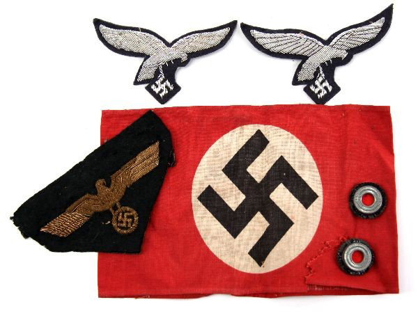 WW2 THIRD REICH INSIGNIA LOT GENERALS EAGLE & MORE: A lot of Third Reich Insignia consisting of a somewhat tattered Armband 2 silver bullion visor Luftwaffe Eagles, a superb gold bullion General rank Army Bevo eagle, ans 2 visor pips.