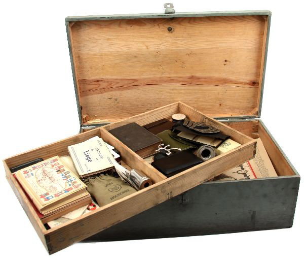 WWII NAVY FOOTLOCKER AND CONTENTS NAMED: WWII US Navy foot locker, named to Master Sgt. Guy R. Long. Many personal effects still inside. Items include two lighters, one of which is engraved with Long's name, unused WWII postcards from Hollan