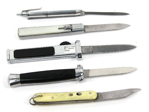 THREE STILETTO & SWITCH BLADE & BUTTERFLY KNIFE: A switch blade knife, by Edgemaster, three un marked blade stilettos presumed Mexican, and a pocket pen butterfly knife. All vintage 1960's and 1970's.