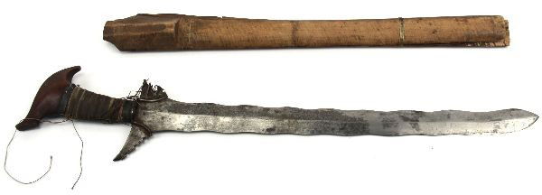 MALAYSIAN ANTIQUE KRIS SWORD BLADE: A fairly low quality Malaysian Kris blade, blade is without Pamon, measuring 25 inches 29 inches overall, mahogany grip.