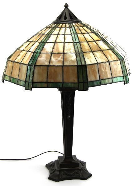 SIGNED HANDEL TABLE LAMP BASE AND SHADE: A beautifully executed octagonal geometric panel shade rests atop a 4 socket (each with a pull chain) square base. Overall height is 29 inches. Shade is 20 inches across and 9 inches tall. Base shows
