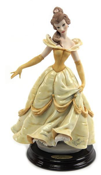 GIUSEPPE ARMANI DISNEY BELLE PORCELAIN FIGURINE: 11 inch porcelain Belle figurine from Walt Disney's Beauty and the Beast, crafted by Giuseppe Armani. Very good condition with original box.