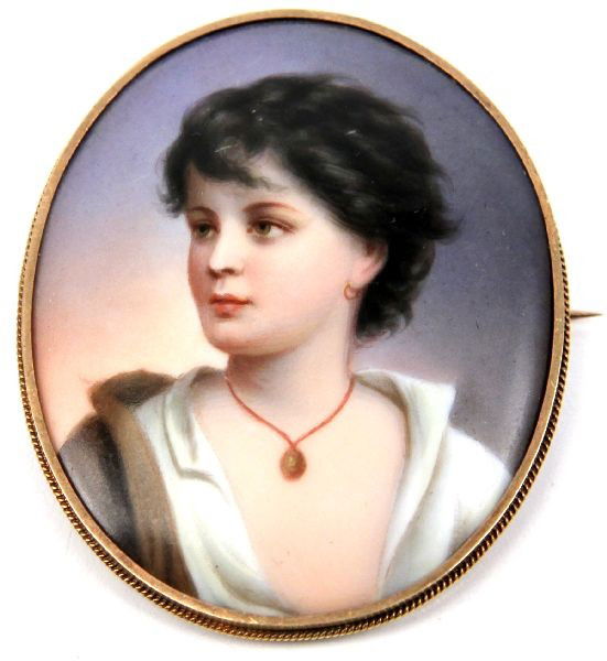 KPM BROOCH PIN OF A YOUNG WOMAN: 2.5 inches tall by 2 inches wide. Beautiful colors and stunning details typical of KPM craftsmanship. Circa 1870. Obverse carries incised "22". Bezel not marked but tests as 14k gold. Very good condit