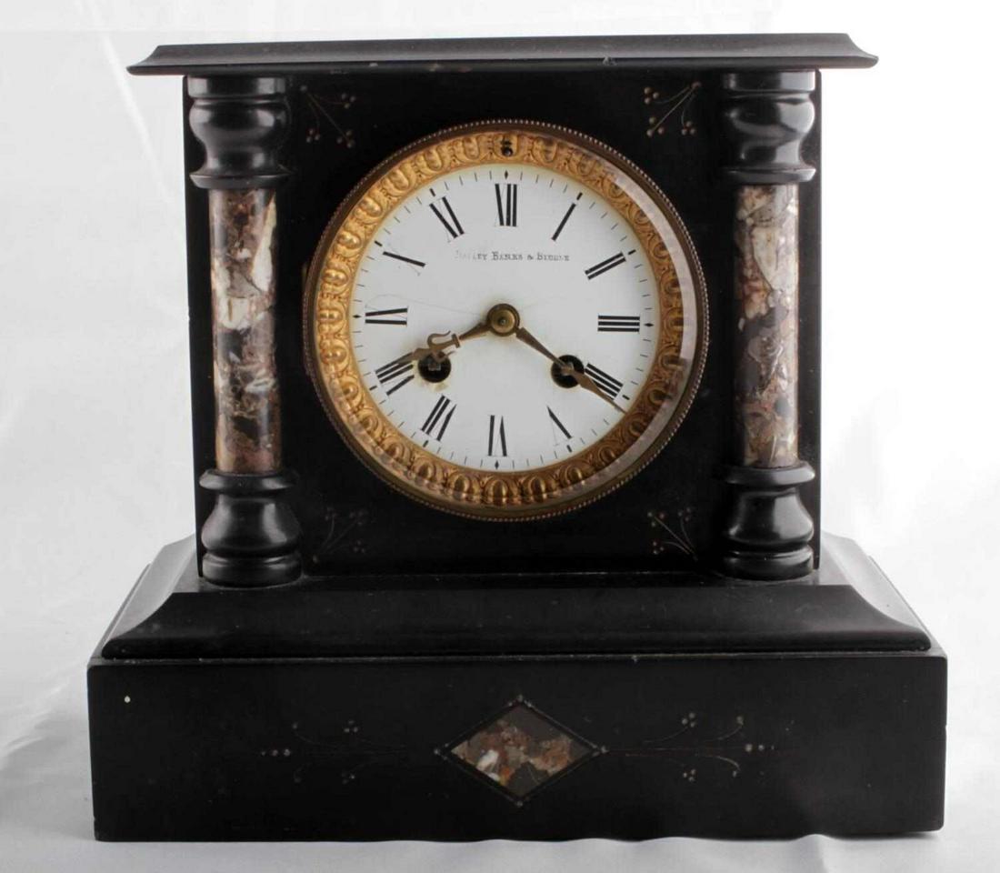 ANTIQUE BAILEY BANKS & BIDDLE MANTLE CLOCK: Marble inlay and black onyx, with keys working condition, but will need servicing, hairline crack in porcelain, chip in left keyhole, 9 x 9 by 5 inches.