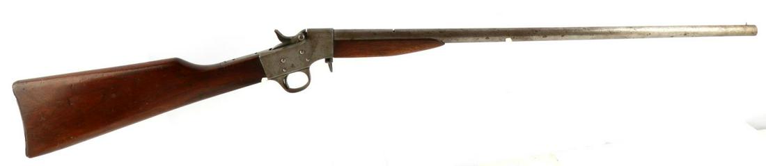 MERIDEN MODEL 6 .22 S OR L VINTAGE YOUTH RIFLE: Tipping-block single shot boy's rifle in .22 short and long. Nickel steel with scattered patina, wood stocks, metal plate, maker, model, and caliber marked at top of 22 inch barrel, good clear bore, a
