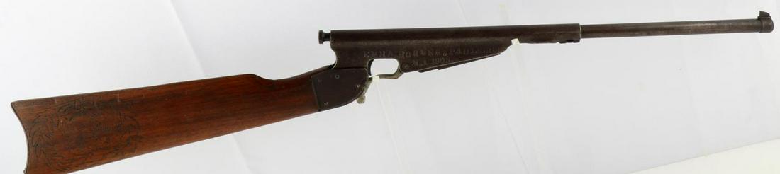 THE HAMILTON RIFLE NO. 15 BOYS YOUTH RIFLE .22 LR: Single shot lever action boy's rifle in .22 caliber. 8 inch brass barrel covered in sheet metal, maker marked to left side, walnut stock, steel plate, Emma Horner, Paulsboro, No. 1905 etched to right 