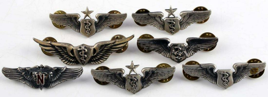 7 KOREA VIETNAM STERLING NURSE FLIGHT SURGEON WING: All are 2 inches except the Army clutch back, all stamped sterling, the nurse is M.S. Meyer pinback, the senior, 1 is Vanguard, one is M.S. Meyer, 1 is just sterling, the remaining 2 are stamped sterl