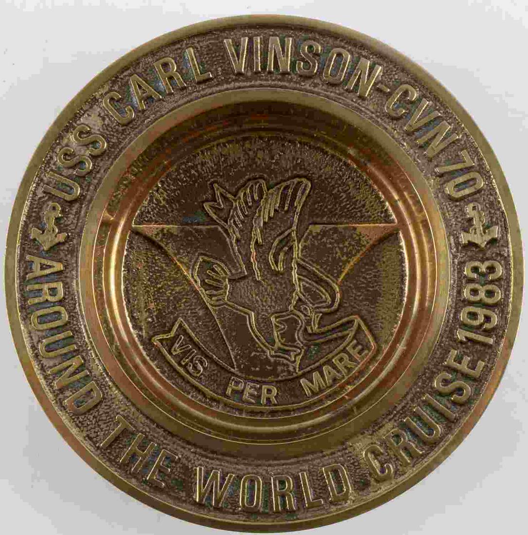 VINTAGE USS CARL VINSON WORLD CRUISE ASHTRAY: USS CARL VINSON CVN70 AROUND THE WORLD CRUISE 1983 on rim. Measures 5 3/4 inches. Brass construction. This lot has a reserve.