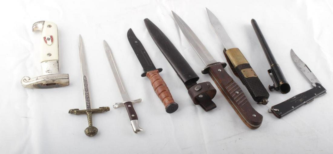 LOT OF 7 GERMAN AND US MARINE FANTASY KNIVES: Lot features a German K55K pocket knife, a k98 bayonet style knife, and a divers knife. Also included are 2 unnamed fantasy blades with a fantasy USMC knife. Measurements range 7 1/2 - 11 1/2 inches.