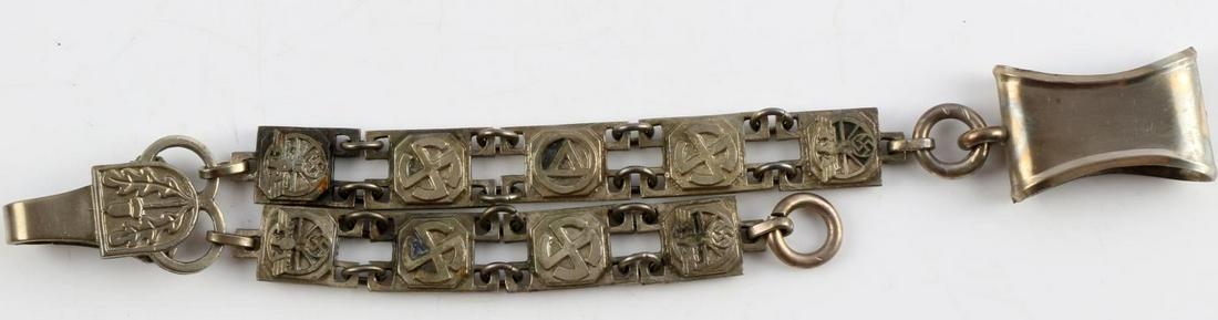 WWII GERMAN THIRD REICH NSKK DAGGER HANGERS NSDAP: WWII German Third Reich NSKK Dagger Hangers, measure approx. 8.5 inches at the longest. NSDAP eagle and emblem designs on alternating links. Reverse of the top two links read "MUSTERSCRUTZ NSKK KORPSF