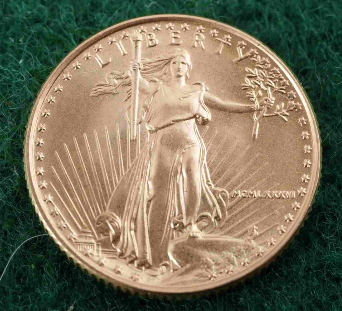 1/10TH OZ AMERICAN EAGLE GOLD COIN 1986 BU: brilliant uncirculated fine gold coin.