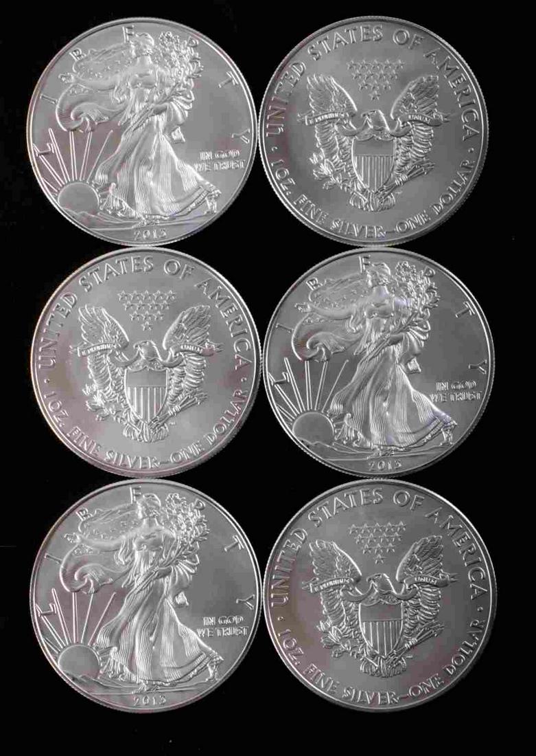 6 AMERICAN EAGLE 1 OZ FINE SILVER COINS: 6 Brilliant uncirculated 1 oz American Eagle silver coins