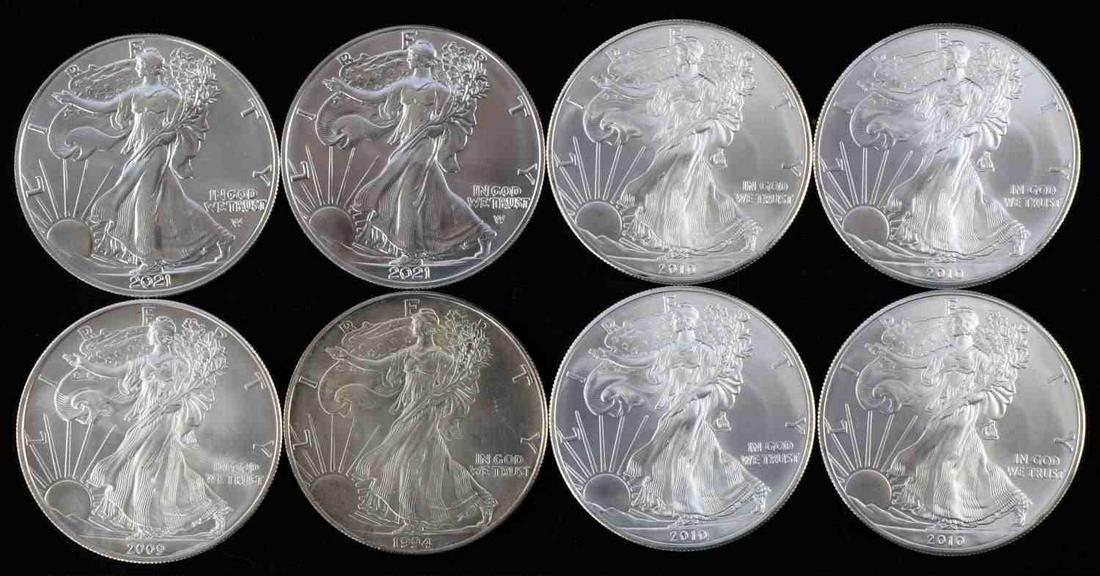 AMERICAN EAGLE 1 OZ SILVER COINS LOT OF 8: Brilliant uncirculated fine silver coins. Mixed dates.
