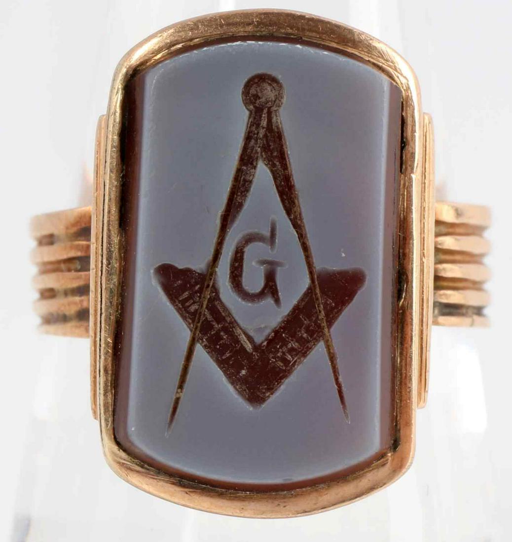 14K YELLOW GOLD INTAGLIO CAMEO MASONIC RING: Ring weighs 4.3 grams, is a size 8.5 and is in very good condition. The shank is void of stamps but acid tests for 14K. In very good condition. This lot has a reserve.