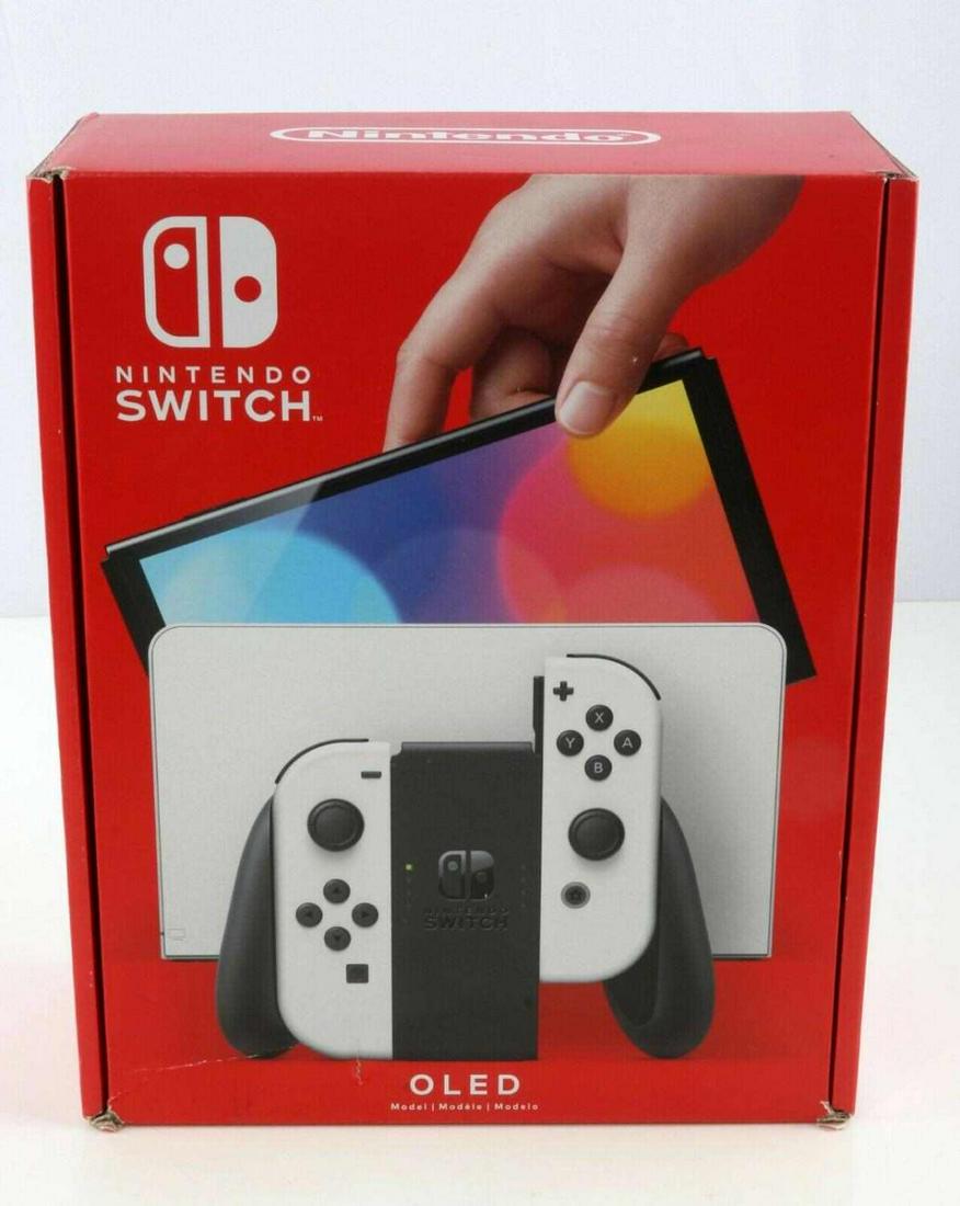 NINTENDO SWITCH OLED GAME CONSOLE NEW IN BOX NIB: Brand new/sealed Nintendo Switch OLED game console. 64 GB system memory, 7-inch OLED screen, dock with LAN port, adjustable stand. Three (3) play modes to choose from: tabletop, TV, or handheld. White
