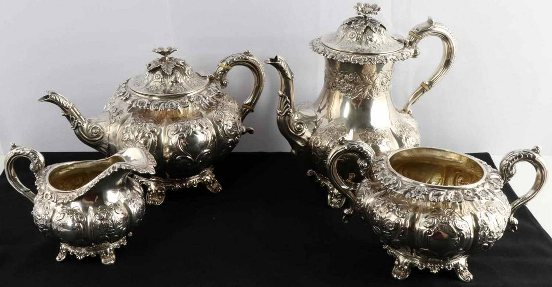 GEORGIAN HALLMARK STERLING SILVER COFFEE & TEA SET: No Monograms, Both Tea and Coffee have ivory accents to handles and are hallmarked: George IV, London, 1835 Cartouche and THH for T.H. Hazelwood. Condition very good, highly detailed floral repousse m