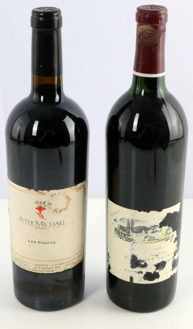 1985 MONDAVI CAB & 2008 PETER MICHAEL LES PAVOTS: 2 bottles of wine: 1985 Robert Mondavi Cabernet Sauvignon Napa Valley, and 2008 Peter Michael Les Pavots red blend. Bottles are sealed and have been stored properly. Minimal erosion of Mondavi capsule