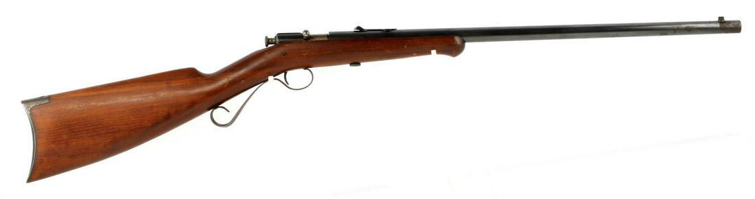 WINCHESTER MODEL 04 .22 CAL YOUTH BOLT RIFLE: Early 1900's manufacture. Features a 21 inch heavy round barrel with bright clean bore, maker marked to barrel, walnut stock, and steel butt plate. Very good condition with minor wear. Requires FFL or