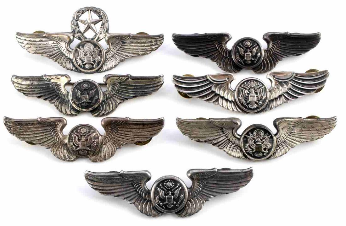 7 WWII STERLING SILVER 3 INCH PILOT OBSERVER WINGS: All are stamped sterling except one but it acid tests for sterling, one pinback balance clutch back, all very good original condition.