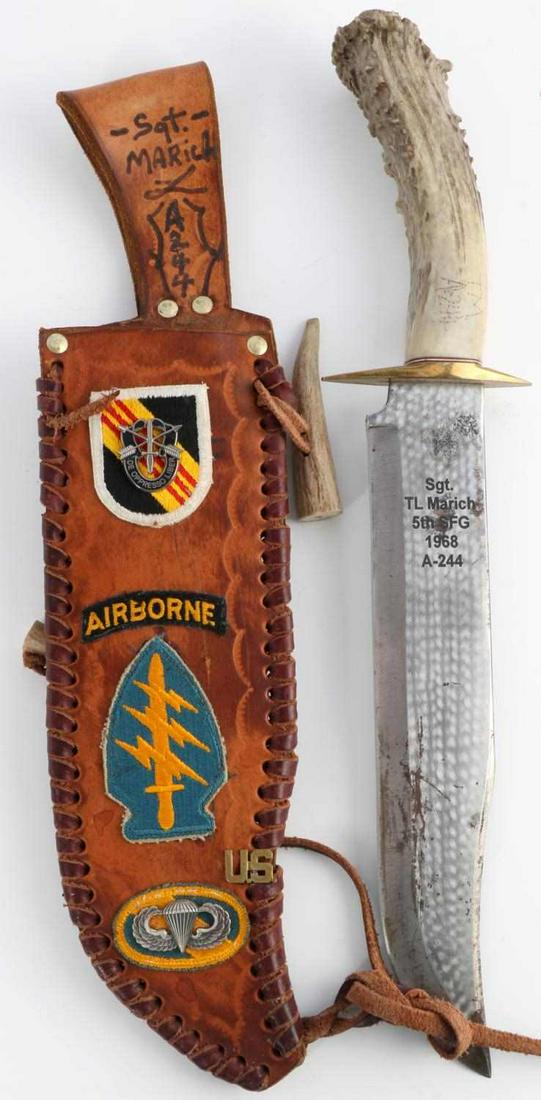 VIETNAM VETERANS PRESENTATION BOWIE KNIFE 5TH SFG: Knife features a 11 1/8 inch blade, marked Sgt. TL Marich 5th SFG 1968 A-244, brass guard, large stag grip, matching named leather sheath with affixed patches and insignia. Comes with several photos o